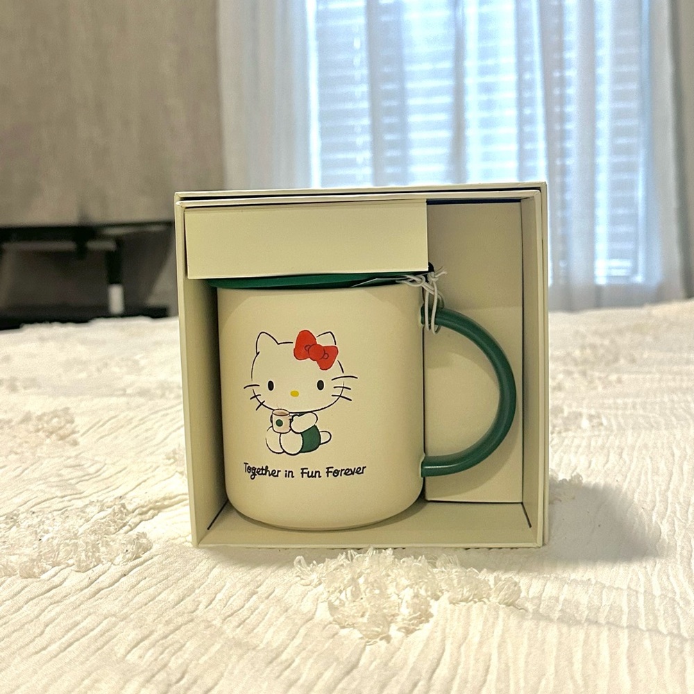 Starbucks Hello Kitty Mug with Green Handle